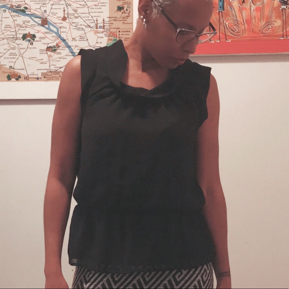 Sheer Peplum-style Black Sleeveless Blouse